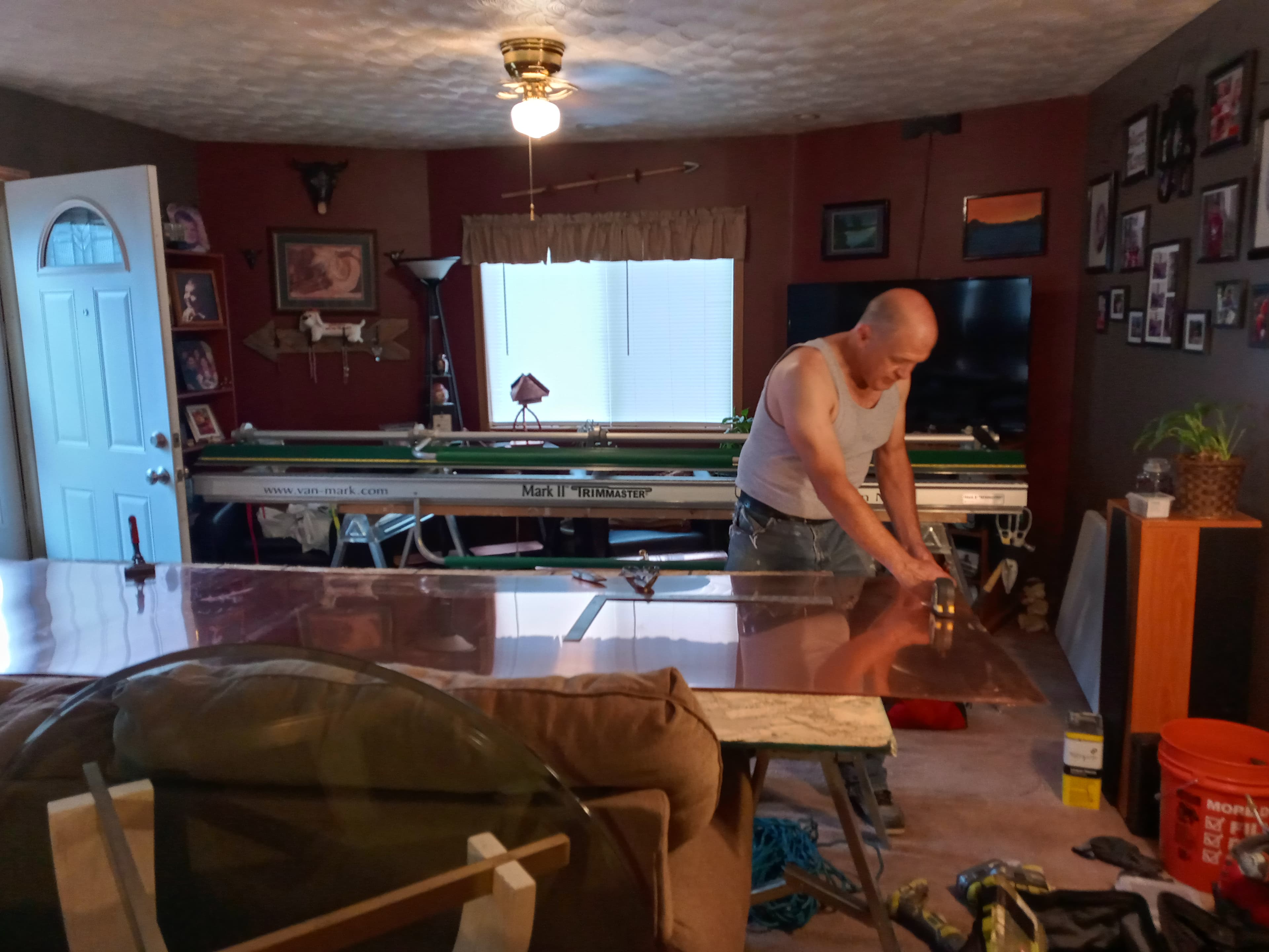 Alexander fabricating copper in his workshop